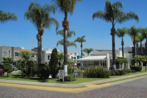 Casa Bon ubicada en Nueva Galicia residencial, es una propiedad completa al sur de la ciudad que te ofrece modernidad, espacio, tranquilidad, cuenta con 4 recamaras 3 baños completos y 2 cajones de es